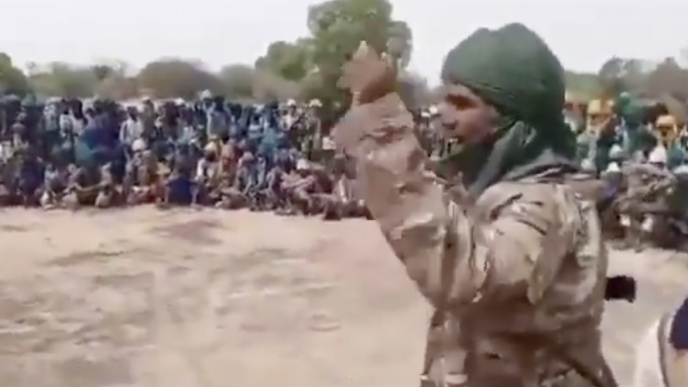 A leader of Lakurawa speaking with its members